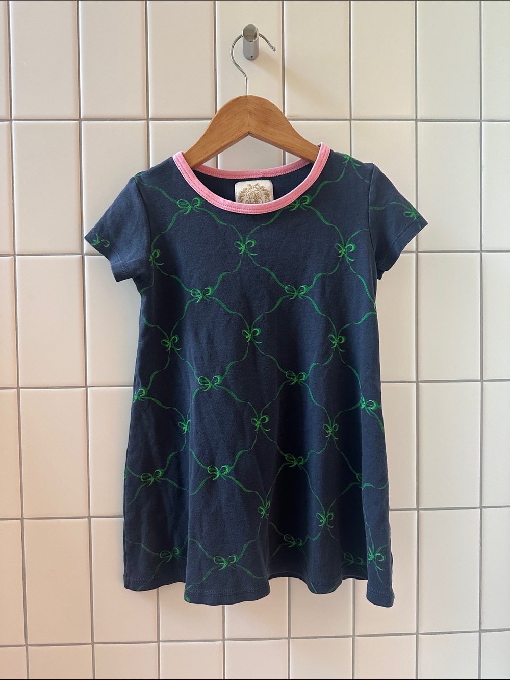 The Beaufort Bonnet Company Navy Dress with Green Bow Pattern and Pink Trim